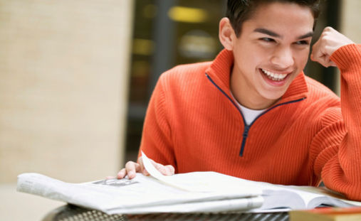 Smiling student studying